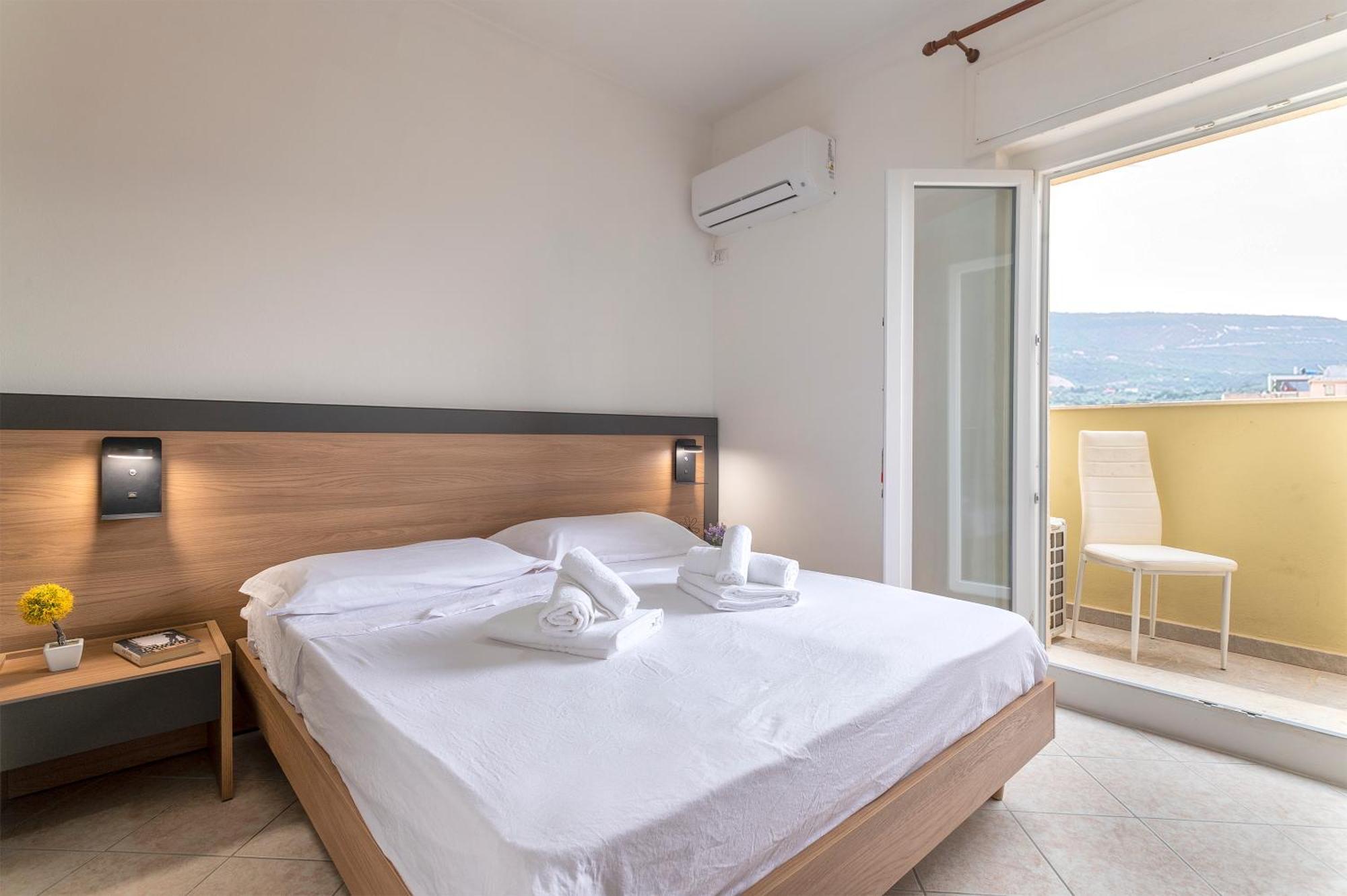Oasis Guest House Алгеро Екстериор снимка