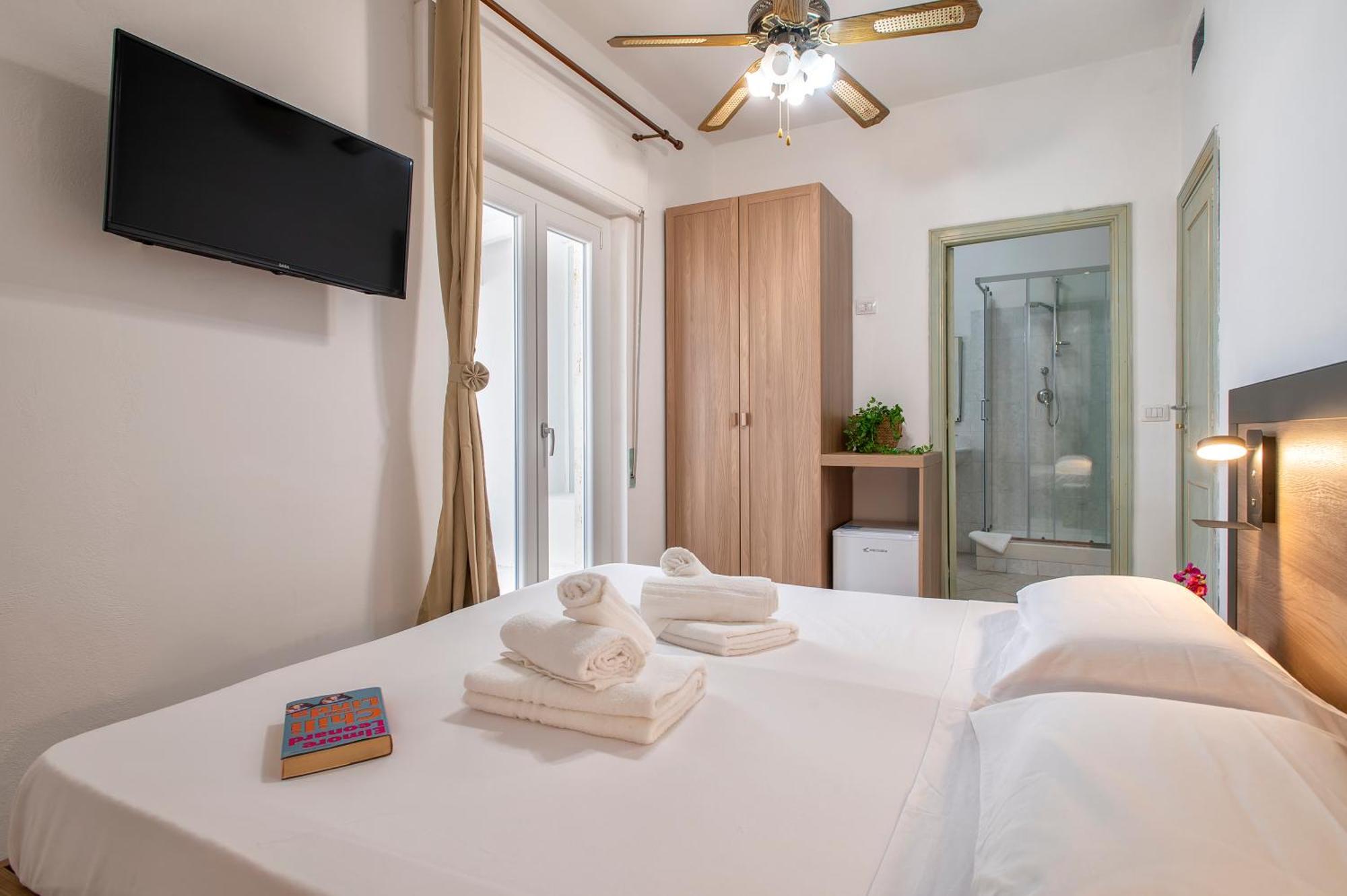 Oasis Guest House Алгеро Екстериор снимка